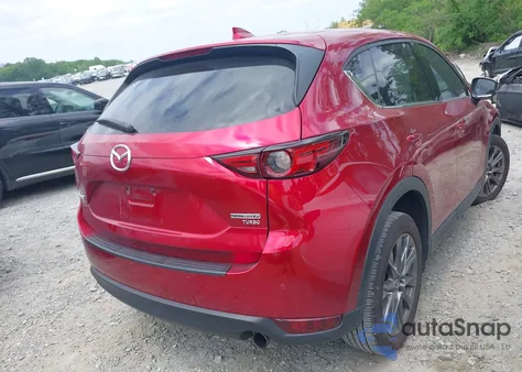2021 Mazda Cx-5 Signature z USA, uszkodzony, nr VIN JM3KFBEY6M0419842